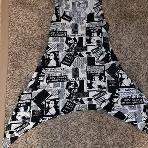 shark bite top.with ladies and newspapers